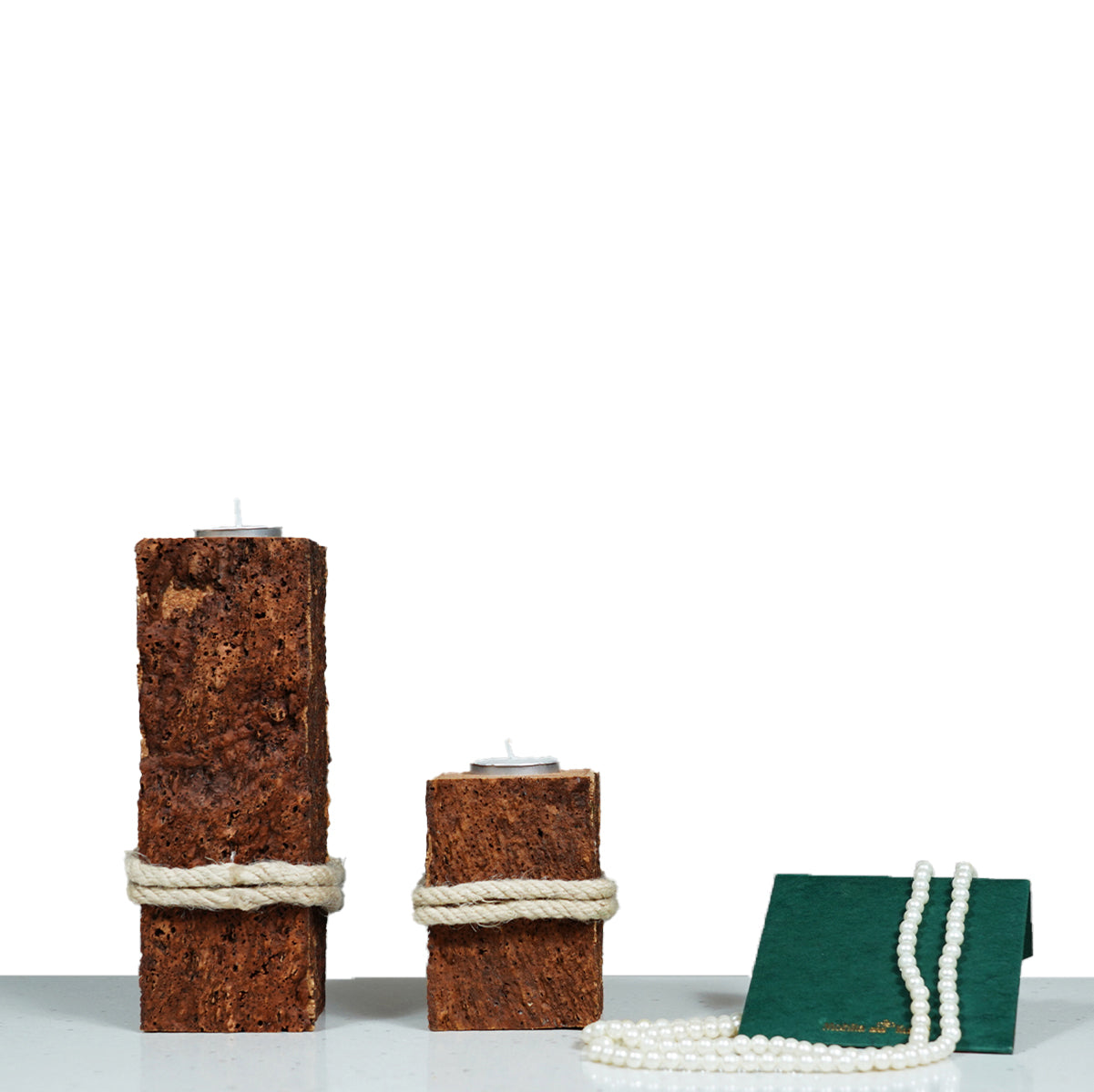 Cork Essentials belly tea light holders on white bg