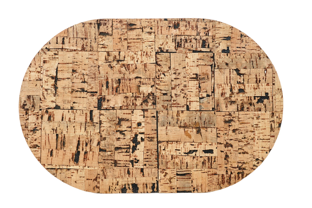 Wood textured oval cork placemat isolated on white