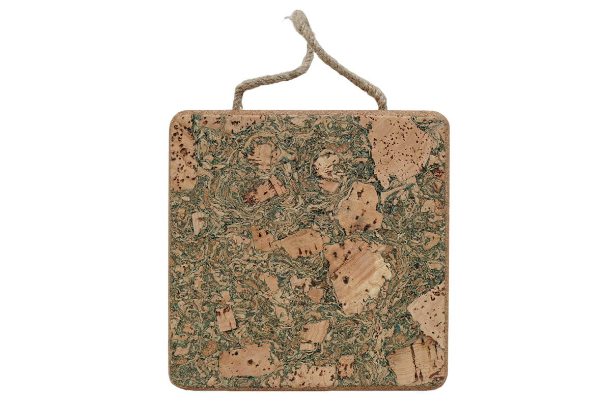 Square cork trivet with handle on white background