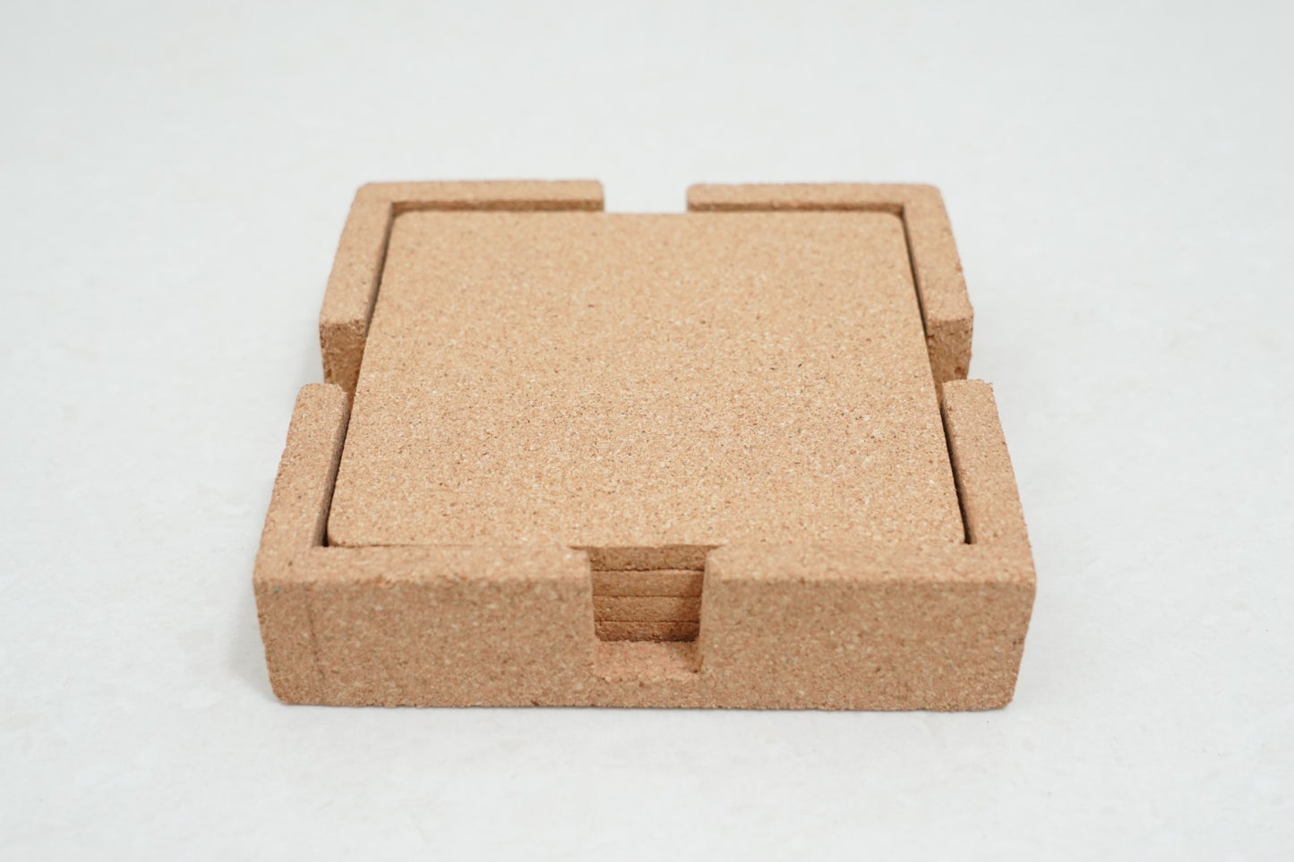Compact square cork coasters set in holder case